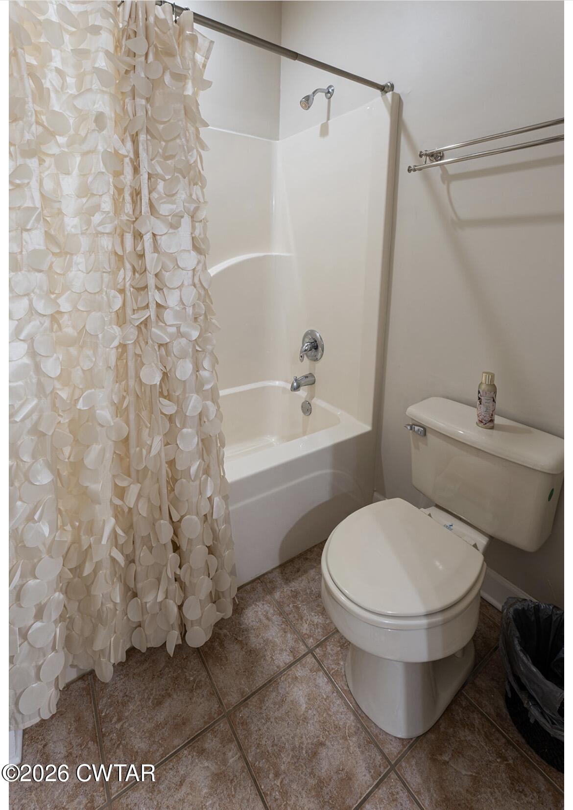 9 Shadow Ridge Drive Jackson, TN 38305 - Photo 15 of 25 a bathroom with a toilet and a shower