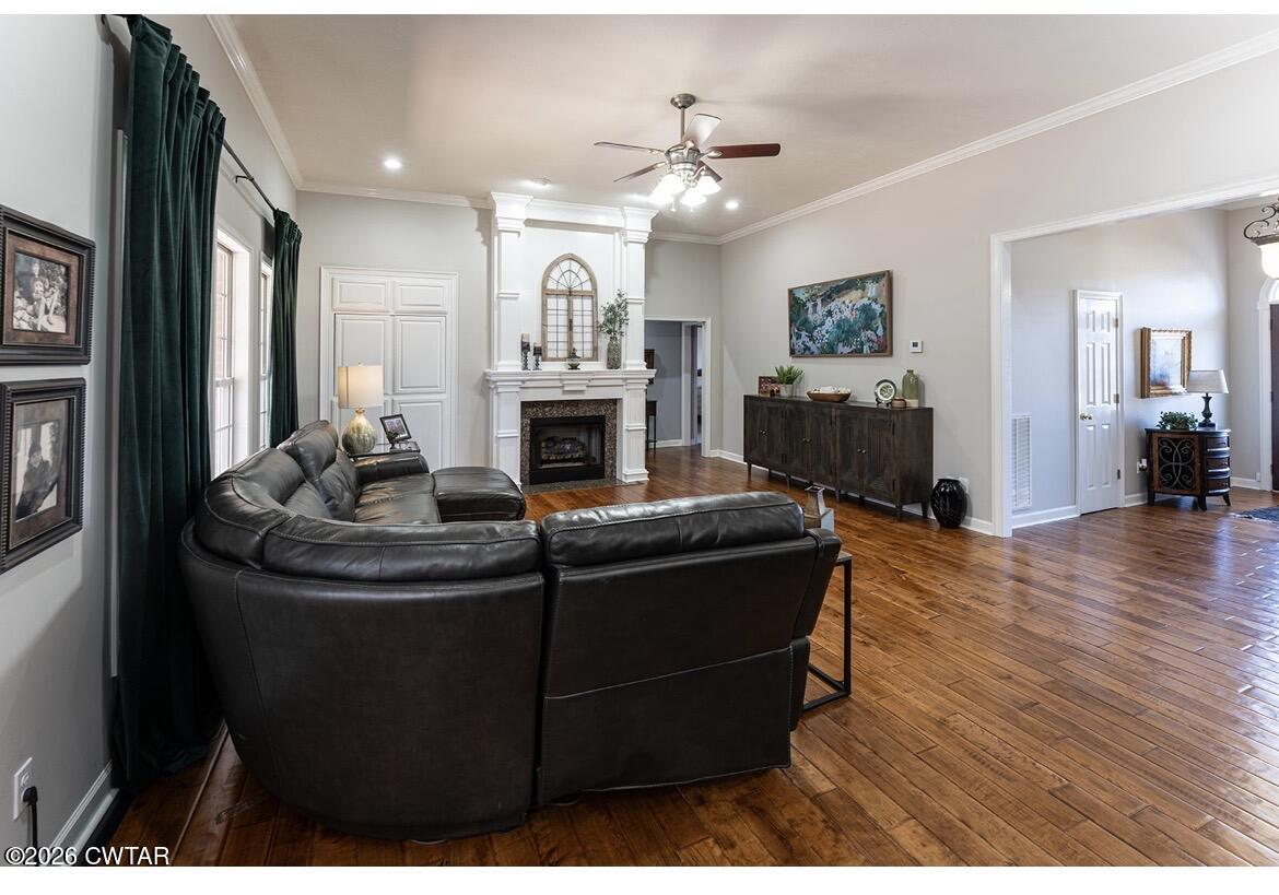 9 Shadow Ridge Drive Jackson, TN 38305 - Photo 2 of 25 a living room with furniture and a fireplace
