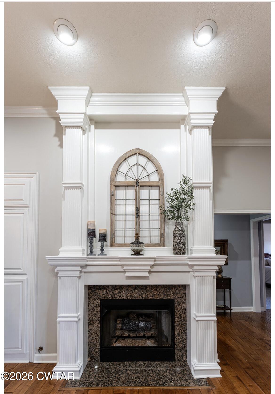 9 Shadow Ridge Drive Jackson, TN 38305 - Photo 3 of 25 a view of a livingroom with a fireplace and window