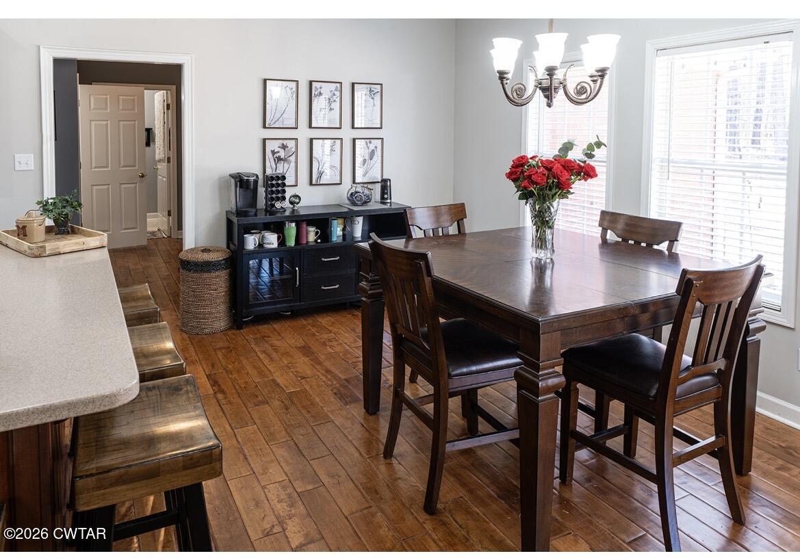 9 Shadow Ridge Drive Jackson, TN 38305 - Photo 7 of 25 a view of a dining room with furniture and chandelier