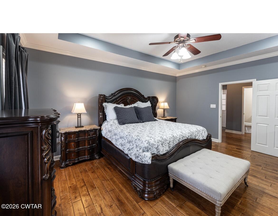 9 Shadow Ridge Drive Jackson, TN 38305 - Photo 8 of 25 a bedroom with bed and window