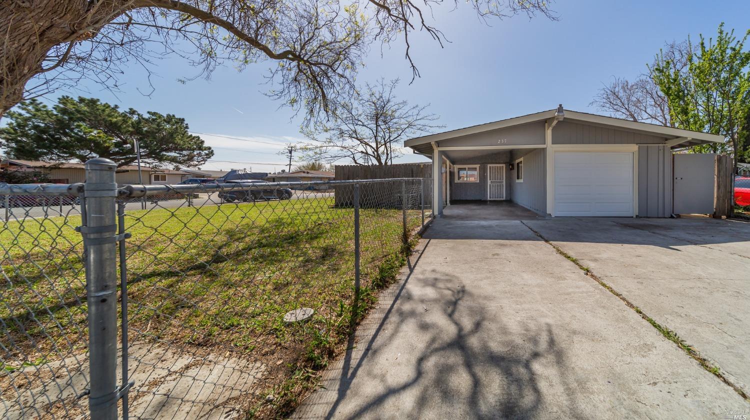 a front view of house with yard