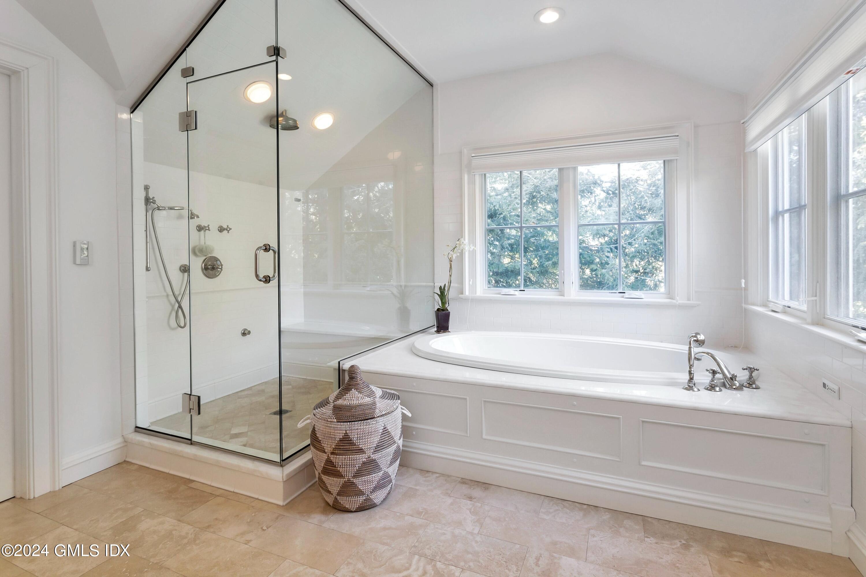 71 Fairfield Road Greenwich, CT 06830 - Photo 18 of 24 a spacious bathroom with a tub shower and sink