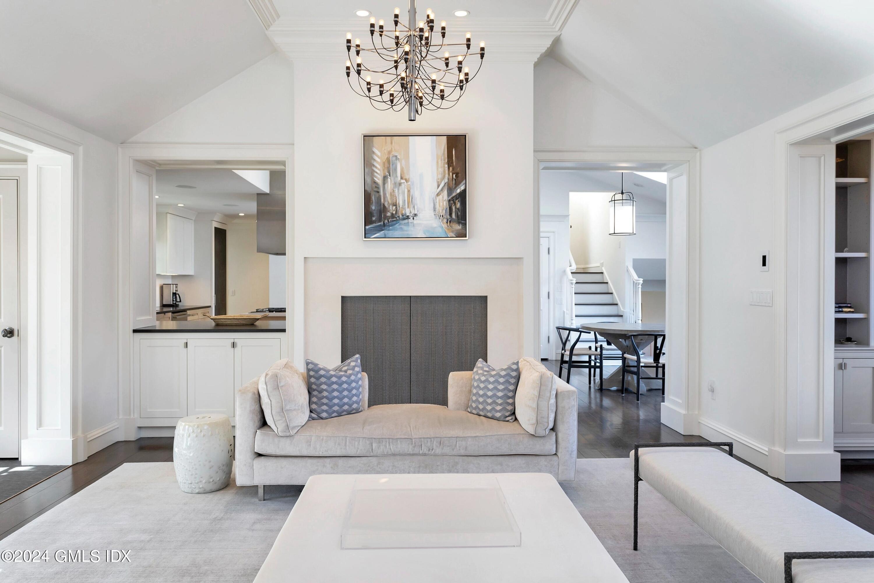 71 Fairfield Road Greenwich, CT 06830 - Photo 5 of 24 a living room with furniture and a fireplace