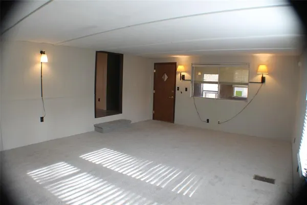 a view of empty room with a window