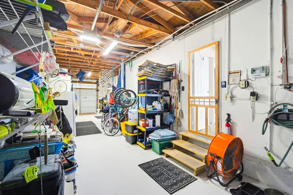 an outdoor space with furniture and umbrella