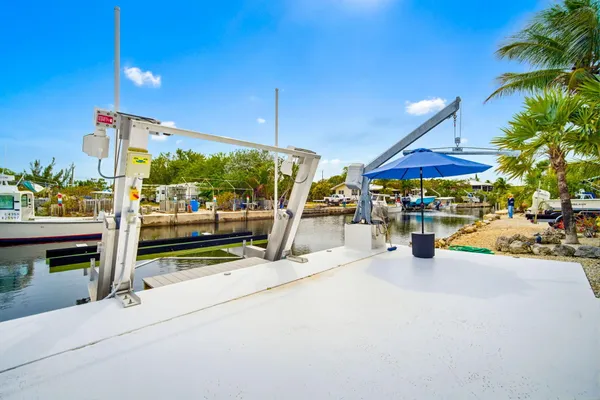 a view of outdoor space with swimming pool and lounge chair