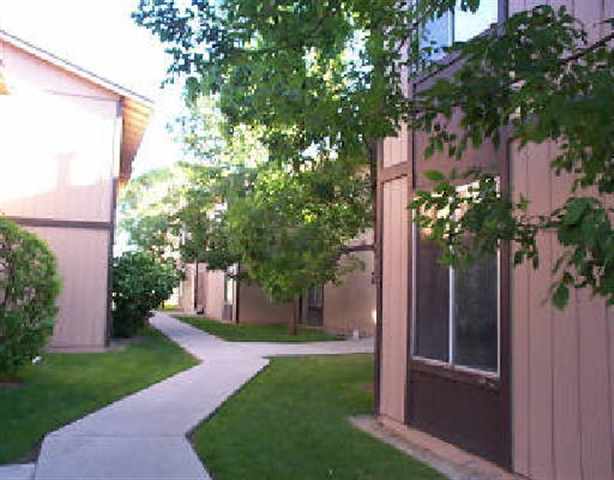 400 Saliman, Unit 32 Carson City, NV 89701 - Photo 2 of 2 a view of a house with a tree front of it