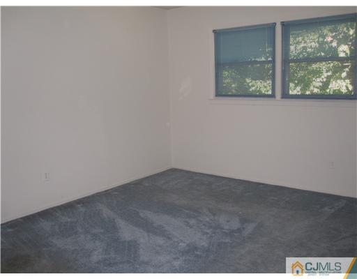 18 Timber Road Edison, NJ 08820 - Photo 11 of 13 an empty room with a window