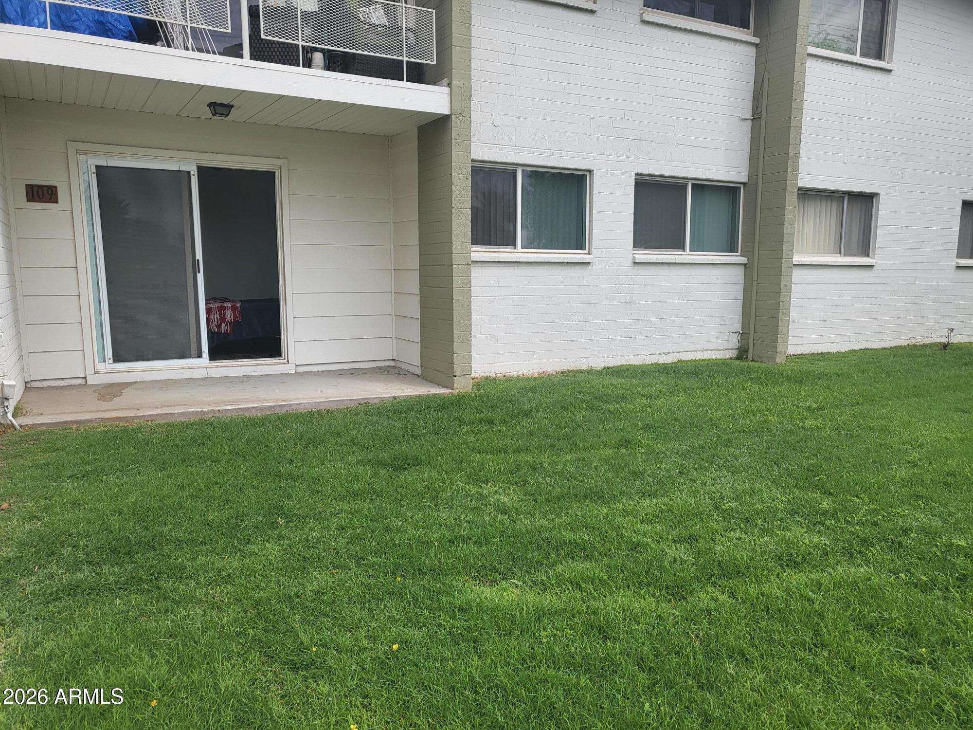 815 North Hayden Road, Unit B109 Scottsdale, AZ 85257 - Photo 13 of 25 a view of front of a house with a yard