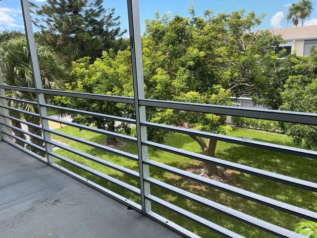 a view of a wooden fence