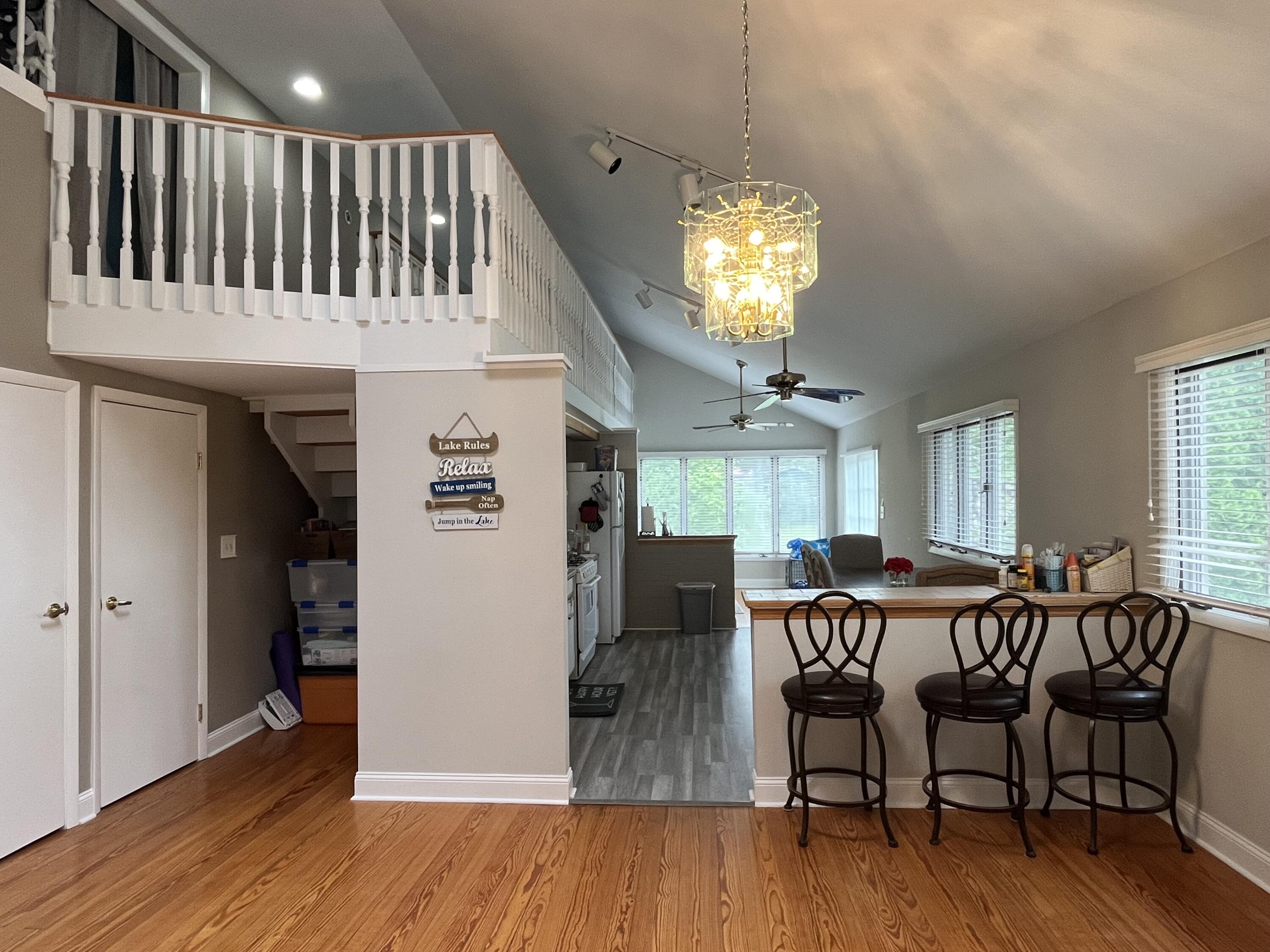 6270 East Donald Road Knox, IN 46534 - Photo 12 of 26 a view of a dining room with furniture window and wooden floor