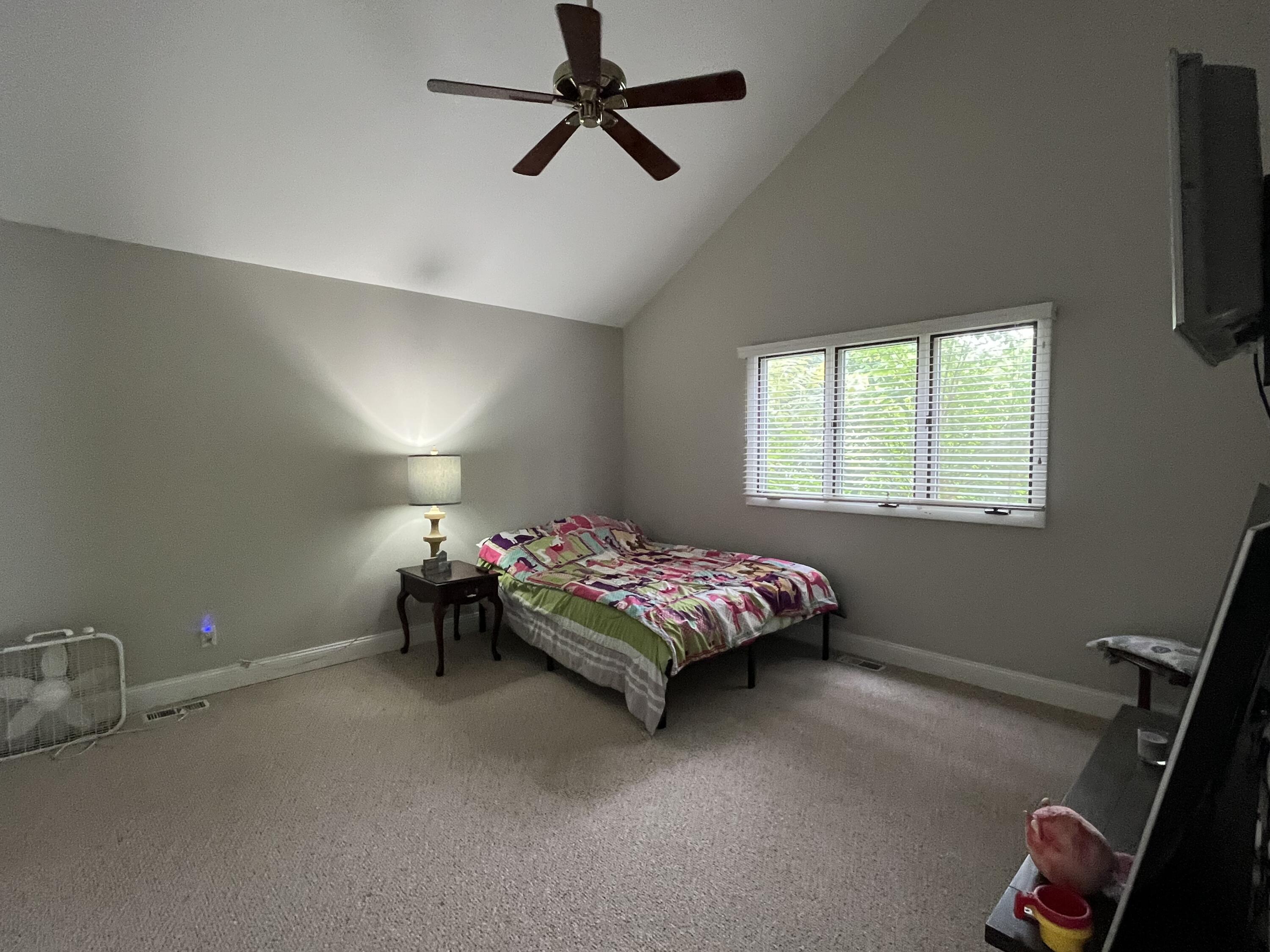 6270 East Donald Road Knox, IN 46534 - Photo 16 of 26 a bedroom with a bed and a tv