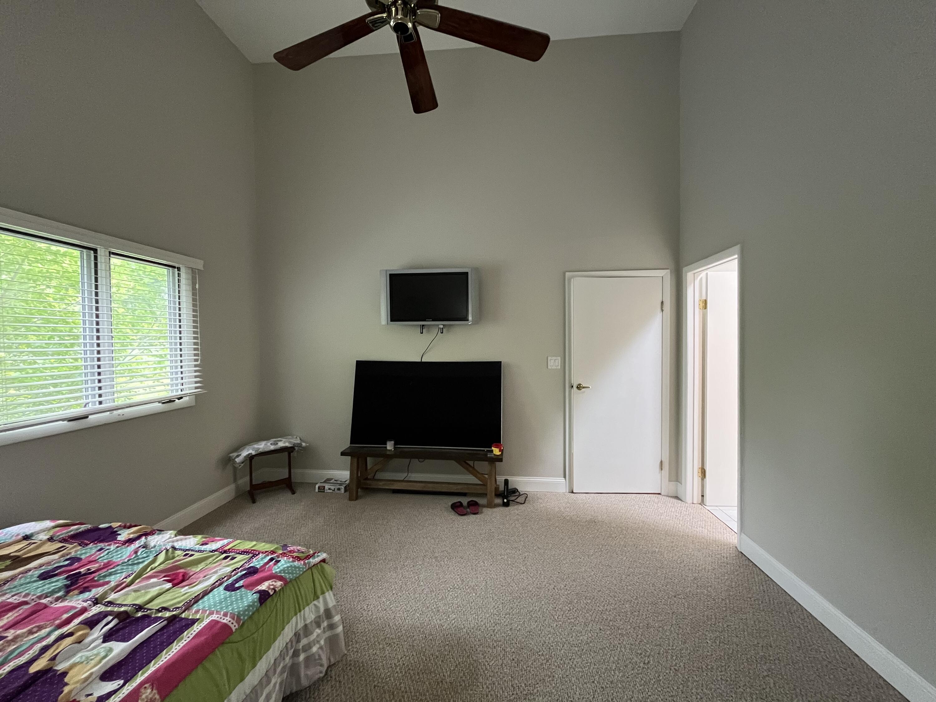 6270 East Donald Road Knox, IN 46534 - Photo 17 of 26 a bedroom with a bed and a tv on the table