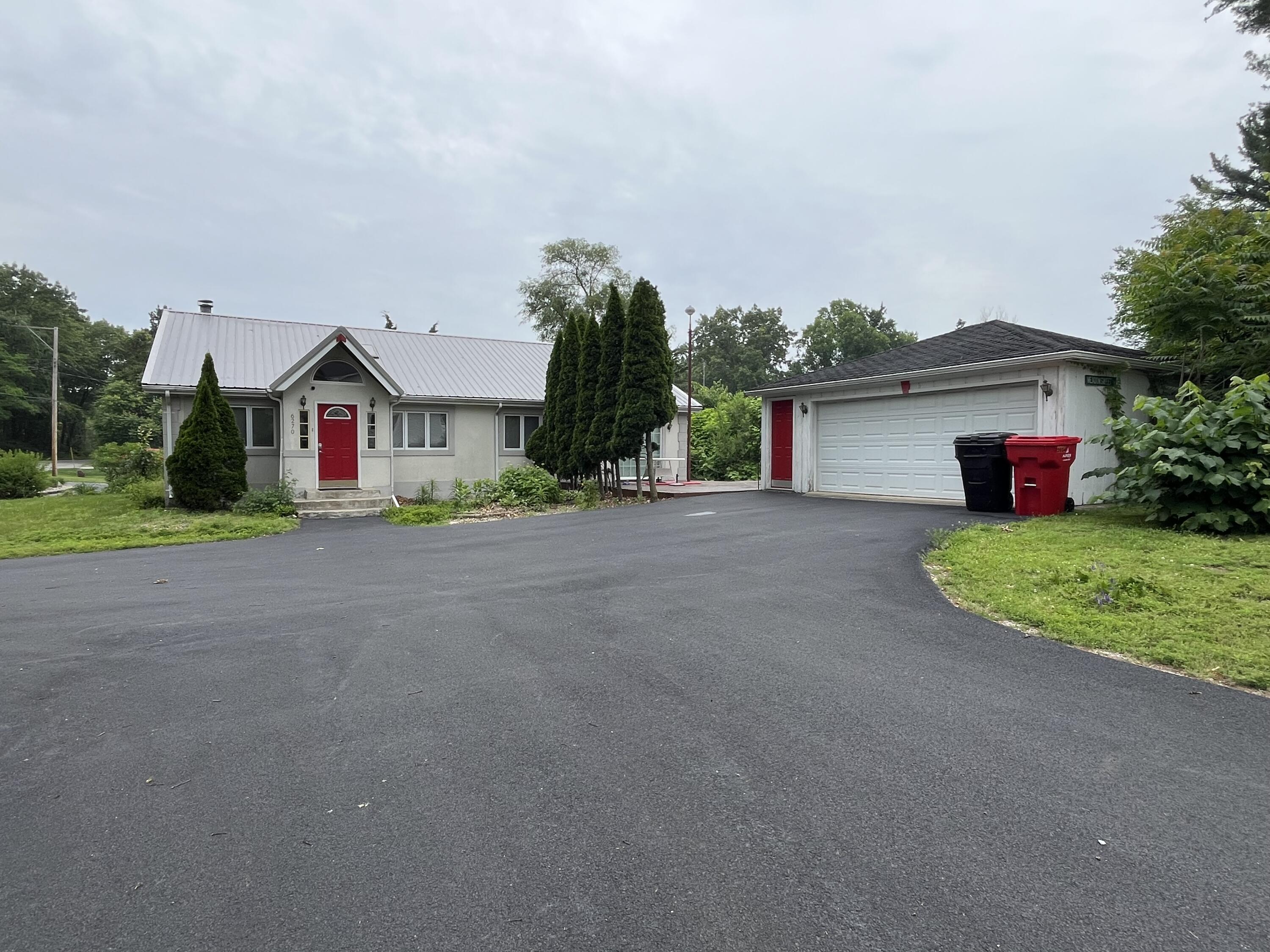 6270 East Donald Road Knox, IN 46534 - Photo 2 of 26 a front view of house with yard and green space