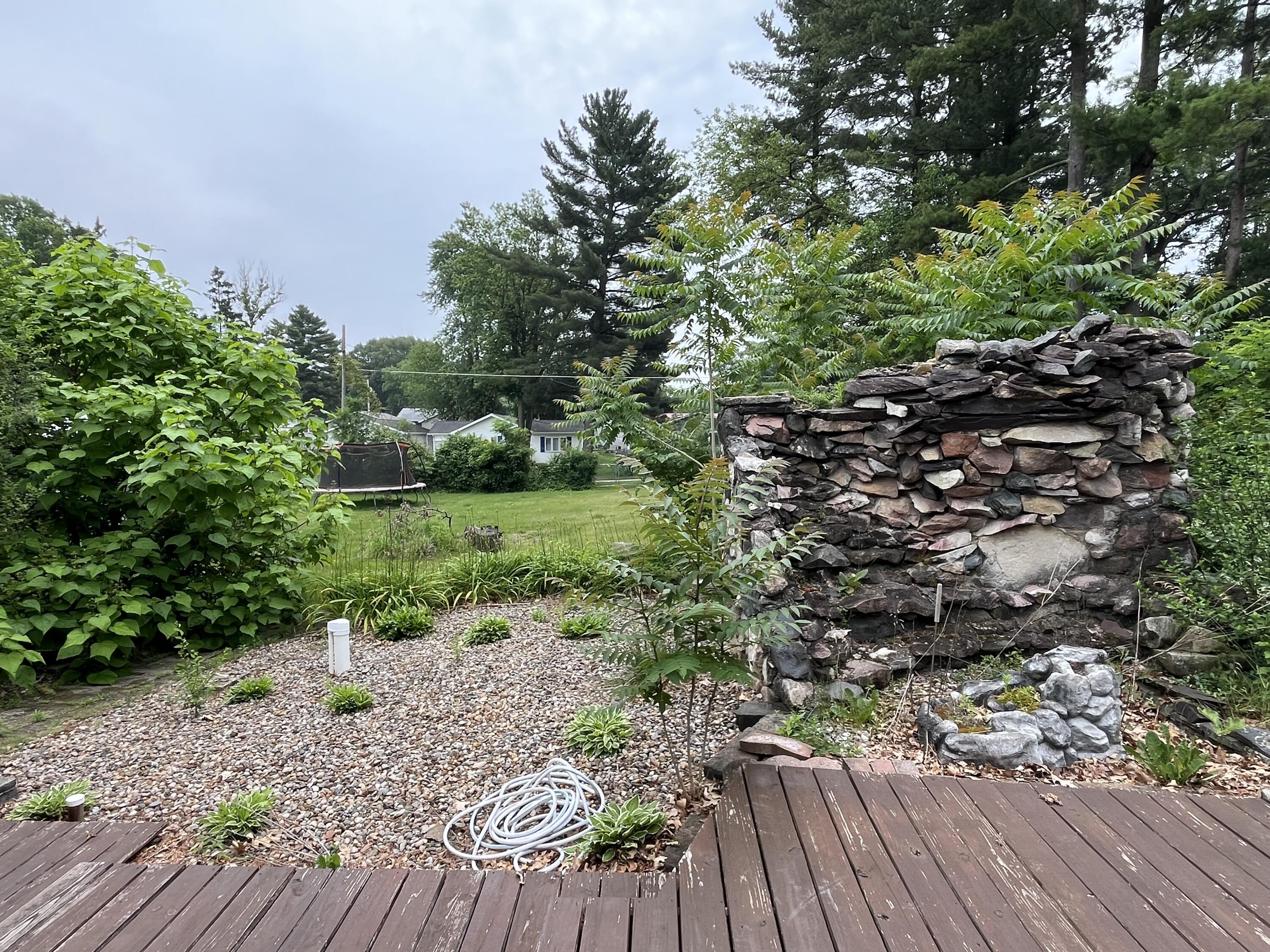 6270 East Donald Road Knox, IN 46534 - Photo 6 of 26 a picture of trees with wooden floor