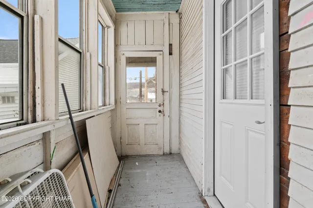 a view of a house with a snow