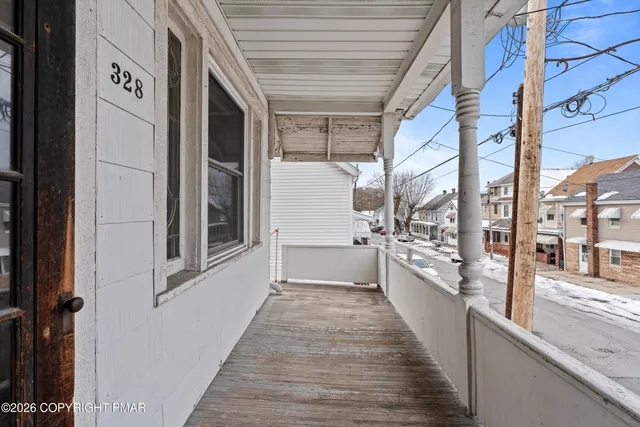 a view of a bathroom with a sink and windows