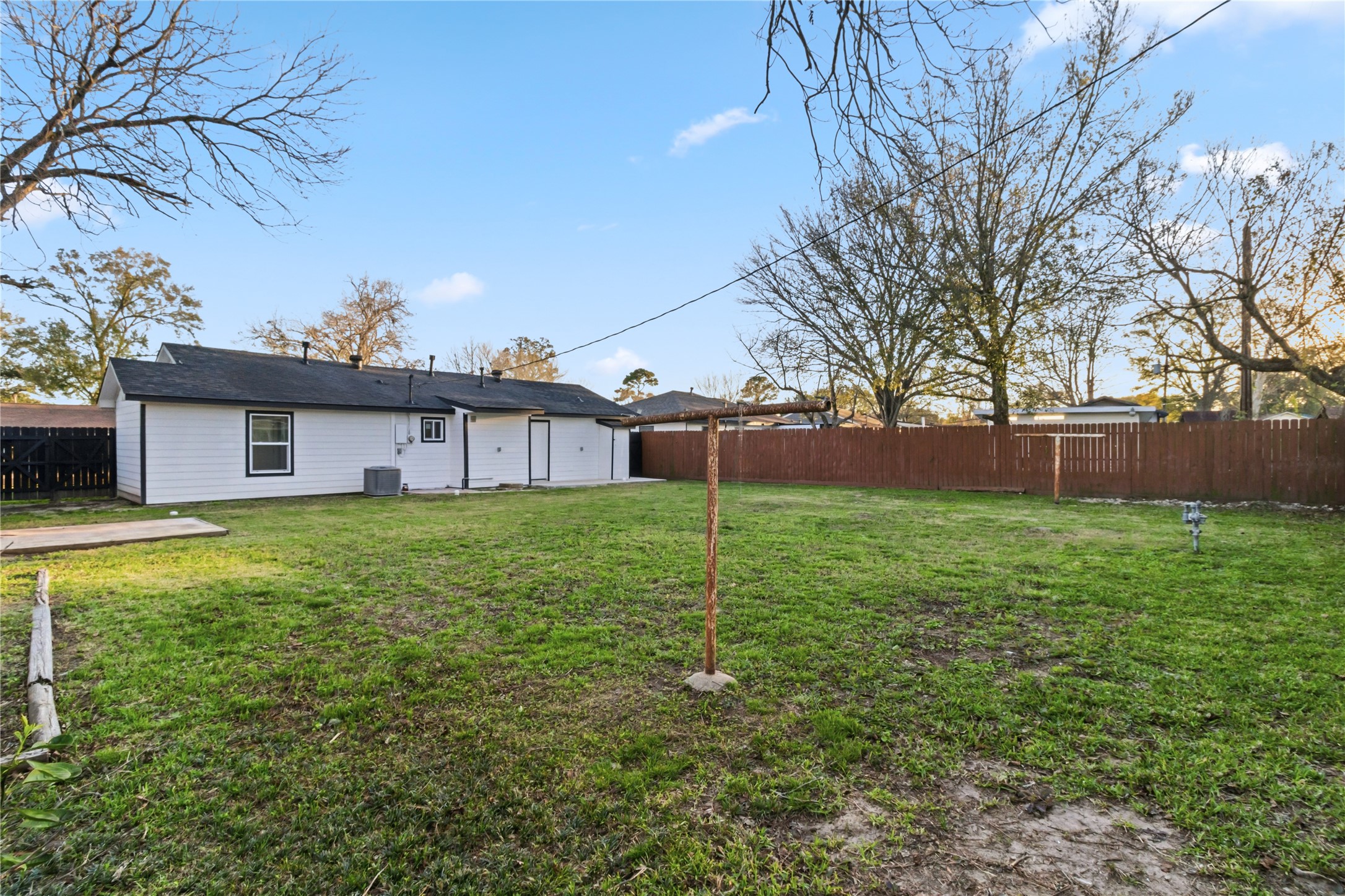 901 South 7th Street Baytown, TX 77520 - Photo 35 of 36 a view of a house with a yard