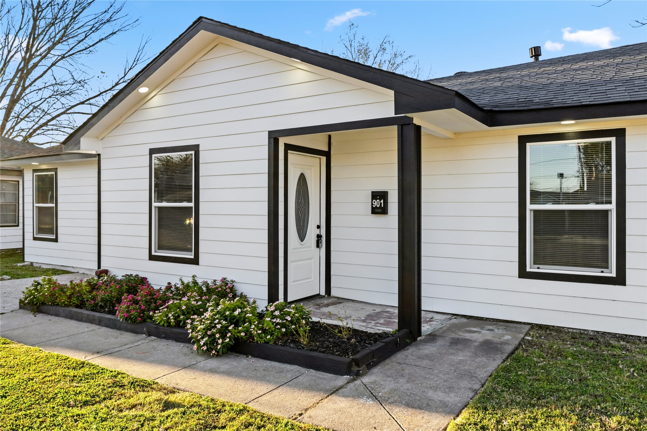 901 South 7th Street Baytown, TX 77520 - Photo 6 of 36 a front view of a house with garden