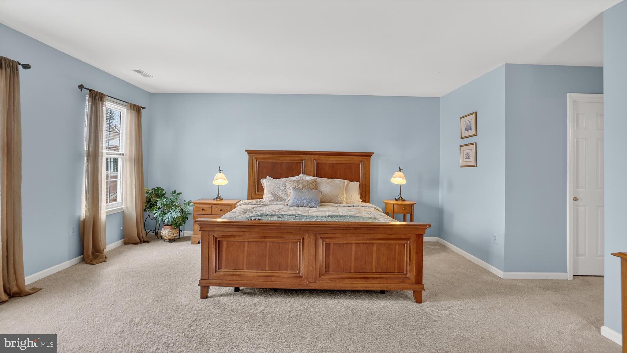 2806 Erna Court Crofton, MD 21054 - Photo 24 of 60 a bedroom with a bed and window