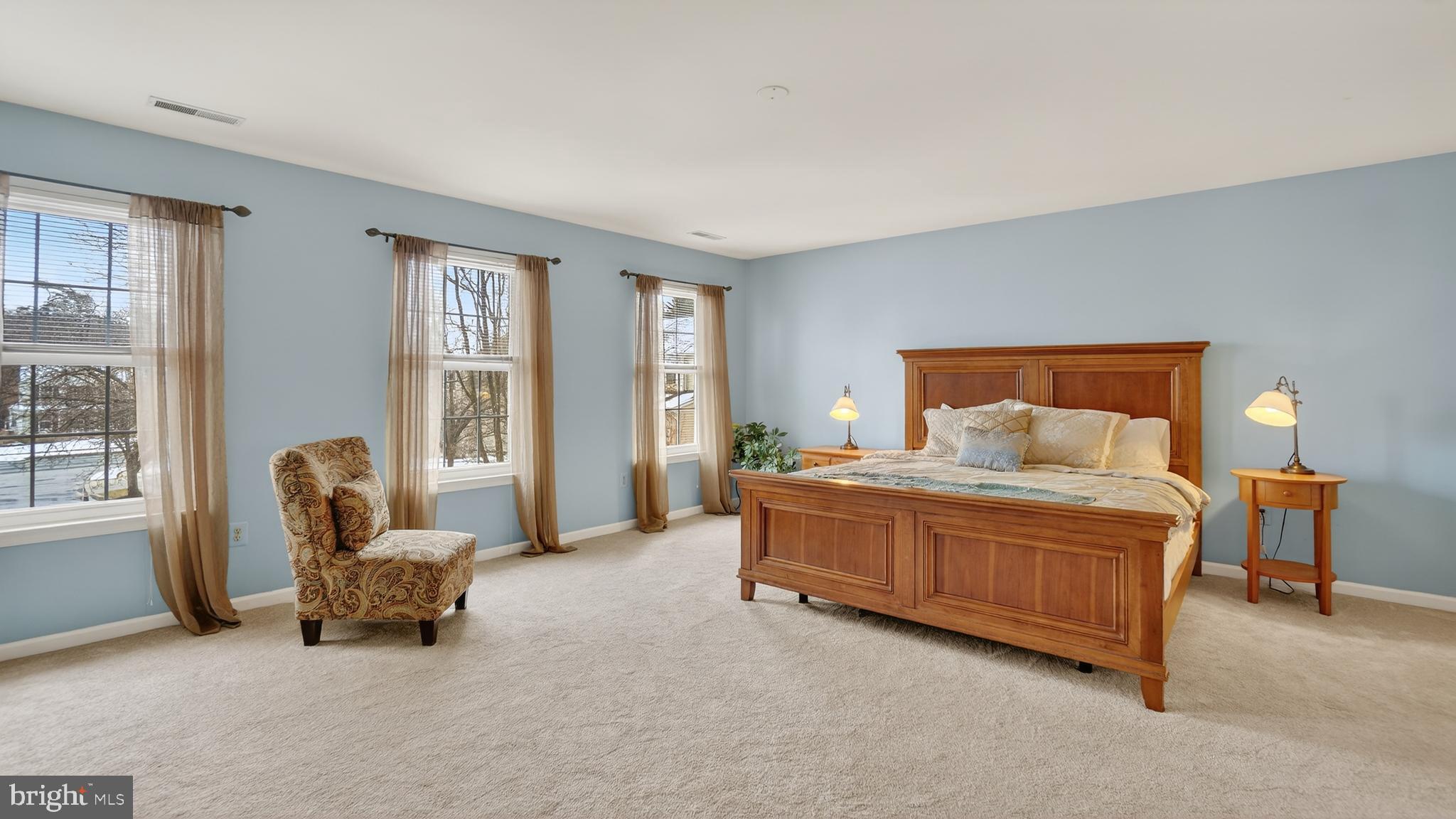 2806 Erna Court Crofton, MD 21054 - Photo 25 of 60 a bedroom with a bed and a couch