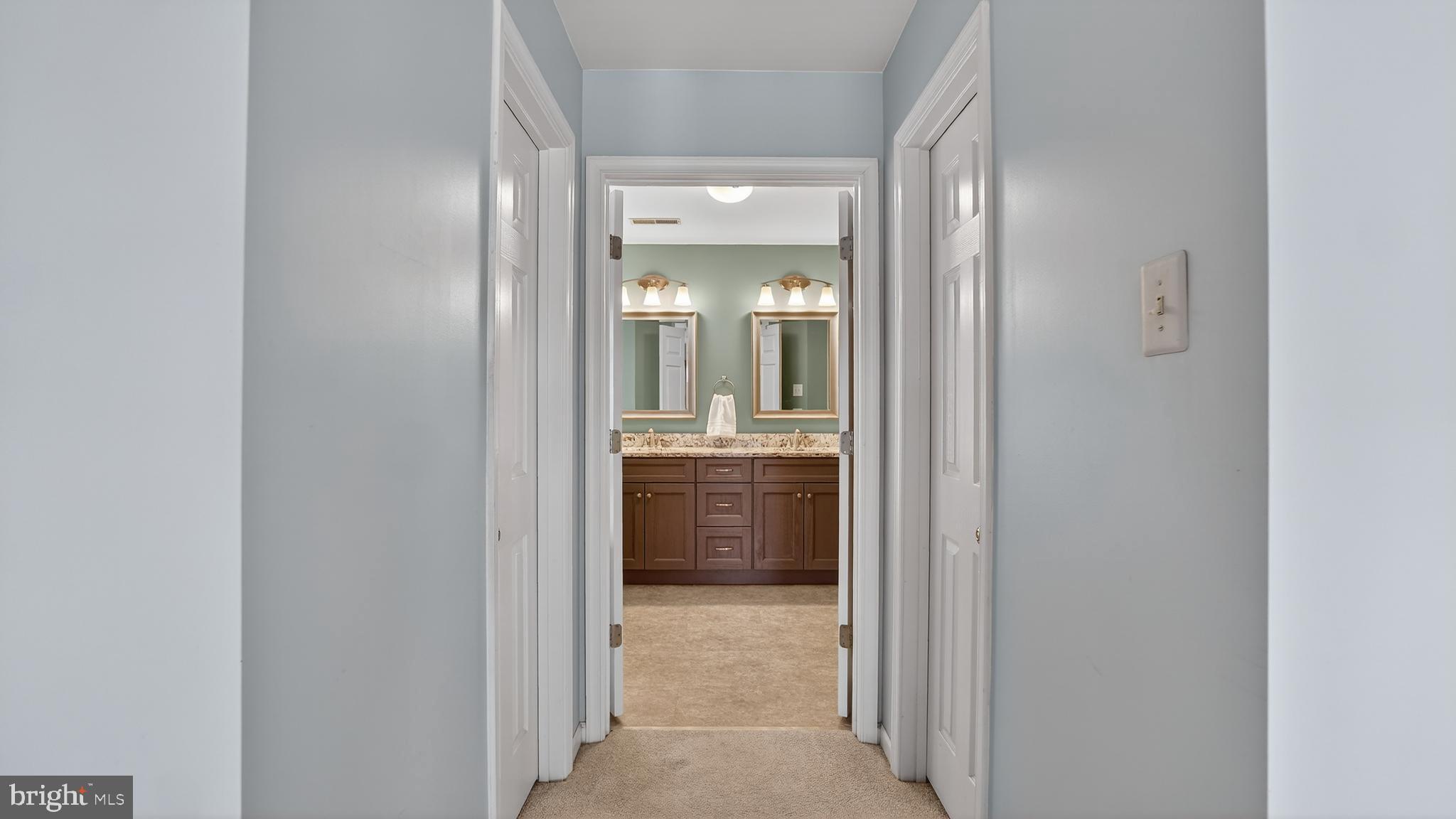 2806 Erna Court Crofton, MD 21054 - Photo 30 of 60 a view of a bathroom from a hallway