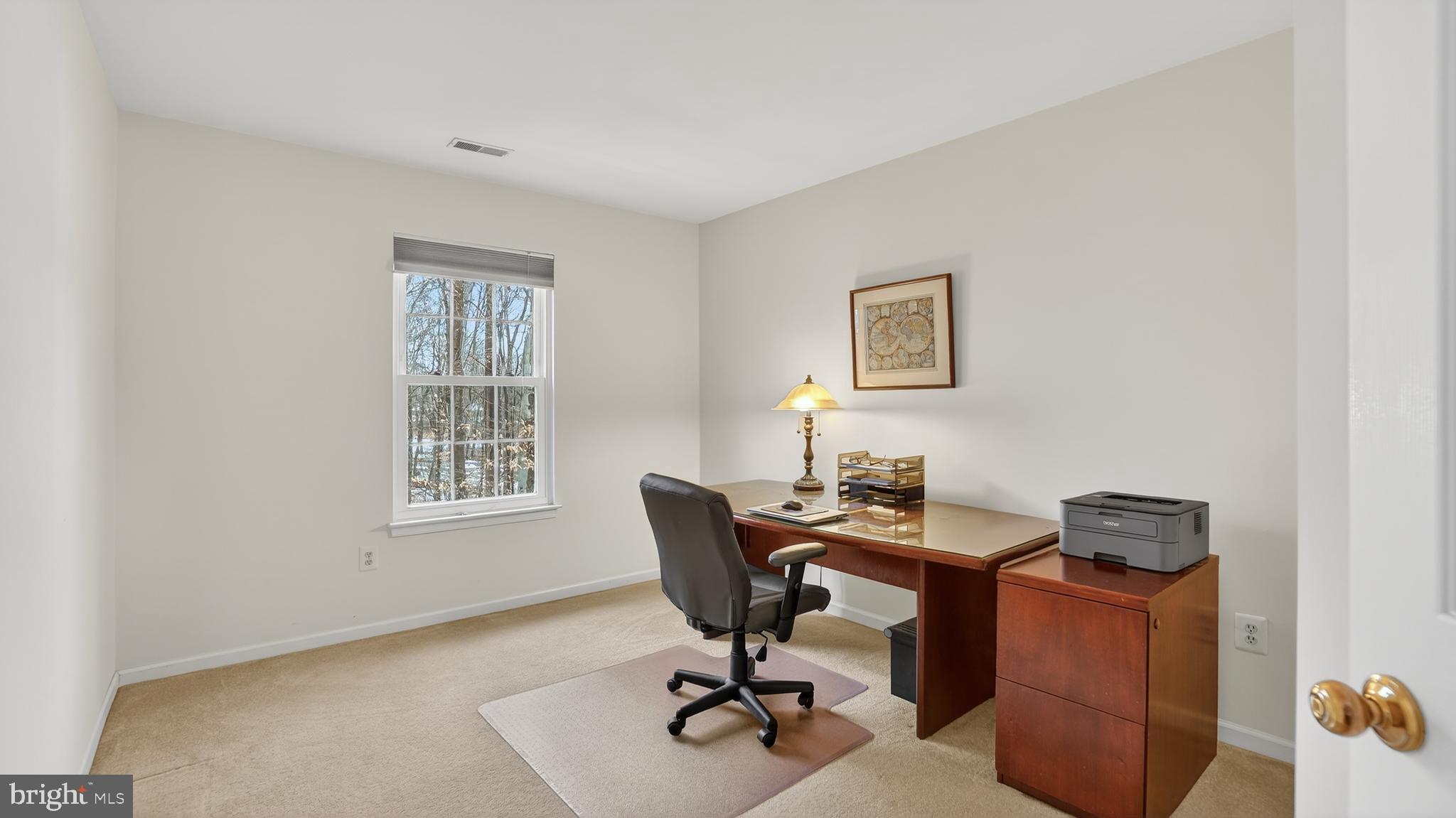 2806 Erna Court Crofton, MD 21054 - Photo 38 of 60 a view of a workspace with furniture and a window