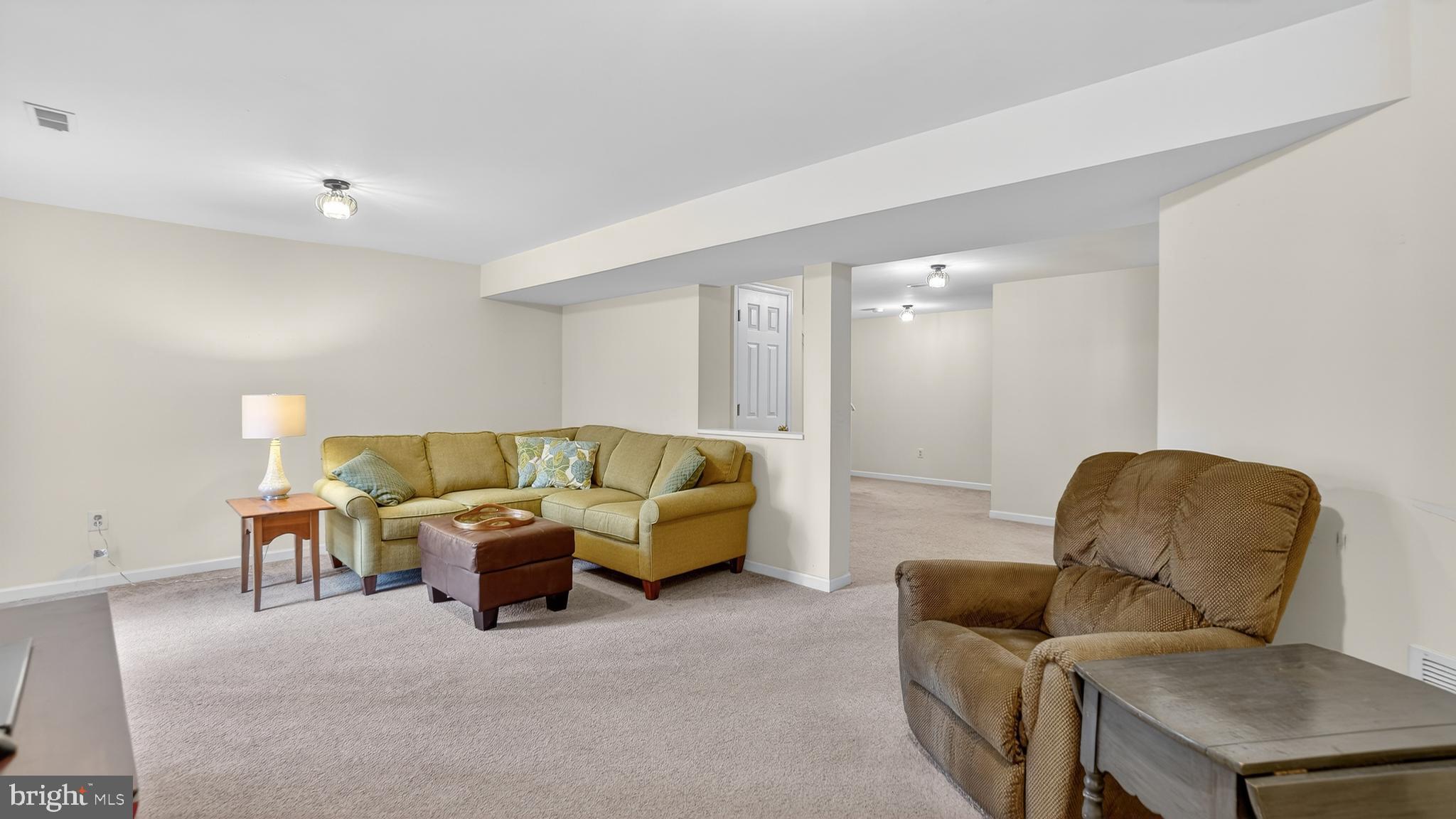 2806 Erna Court Crofton, MD 21054 - Photo 45 of 60 a bed room with furniture and a couch