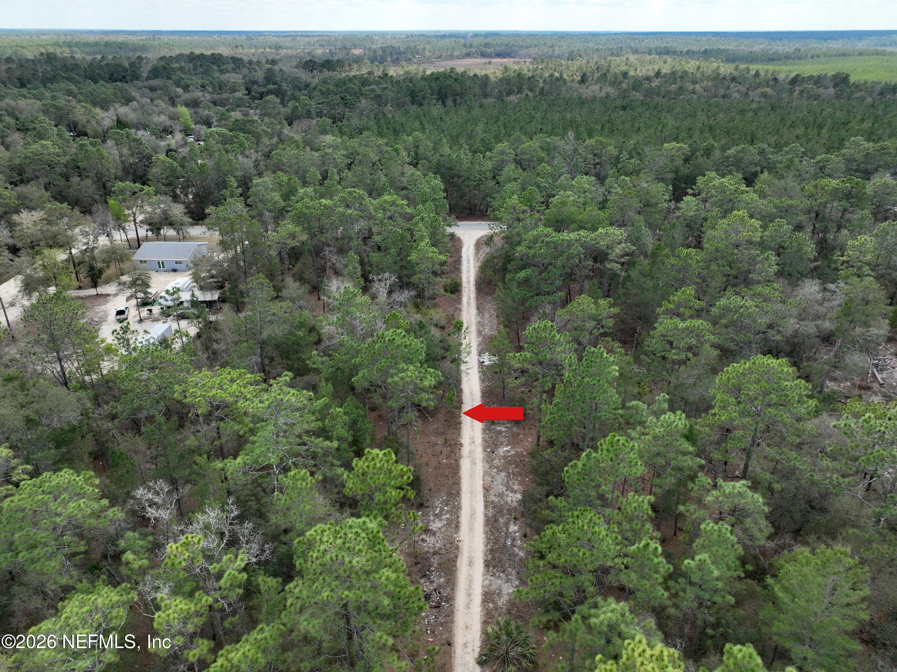 416 Mourning Dove Road Satsuma, FL 32189 - Photo 16 of 22 an aerial view of residential house and green space
