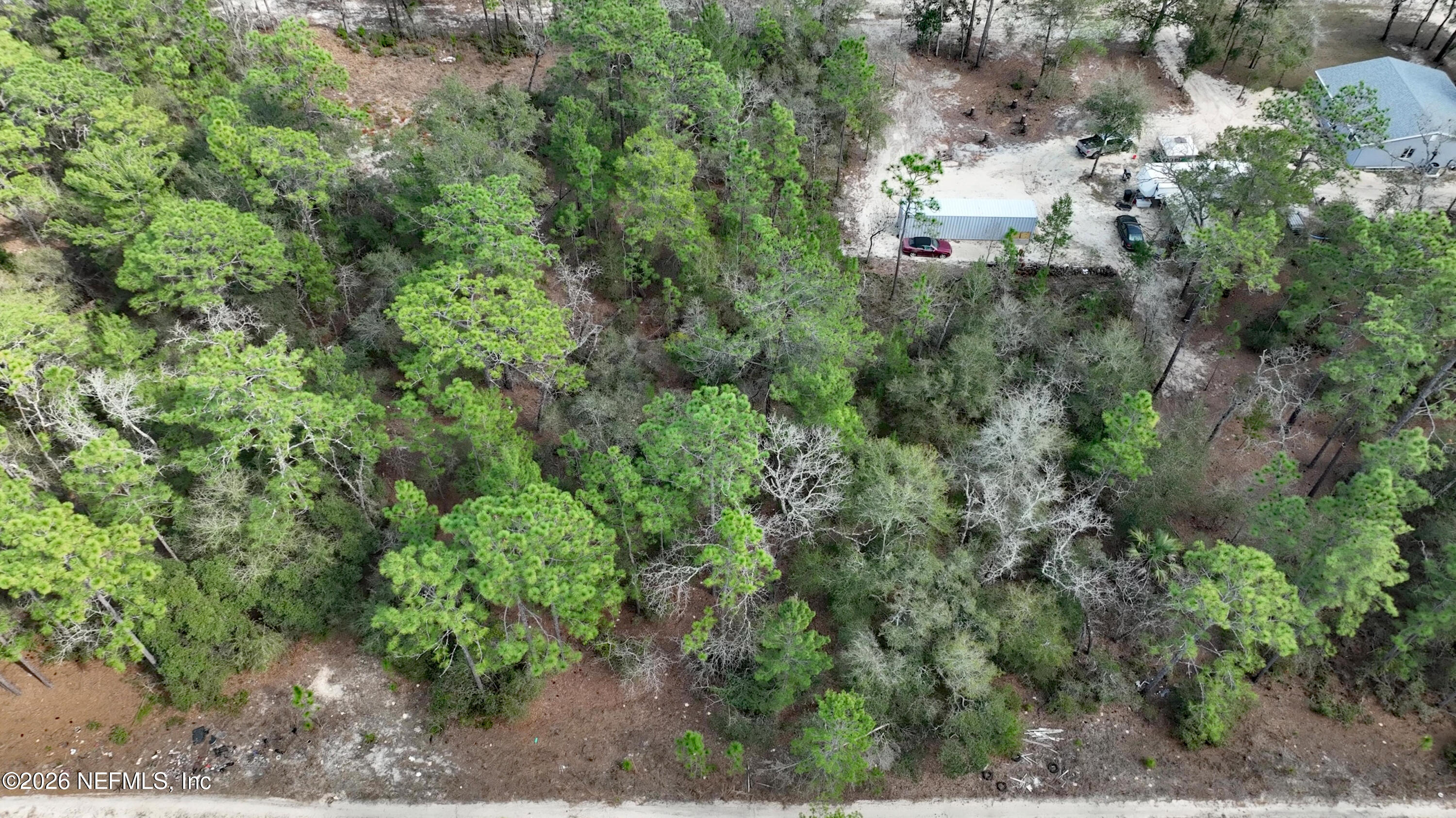 416 Mourning Dove Road Satsuma, FL 32189 - Photo 22 of 22 an aerial view of a house with a yard