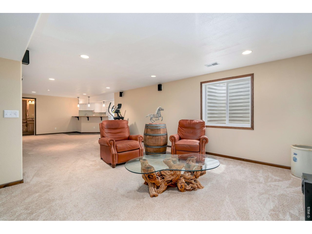 3779 Mount Meeker Street Wellington, CO 80549 - Photo 16 of 30 a living room with furniture and a table