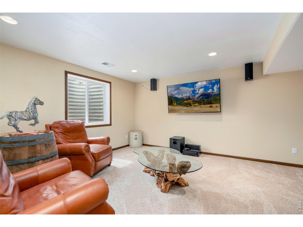 3779 Mount Meeker Street Wellington, CO 80549 - Photo 18 of 30 a living room with furniture a rug and a window