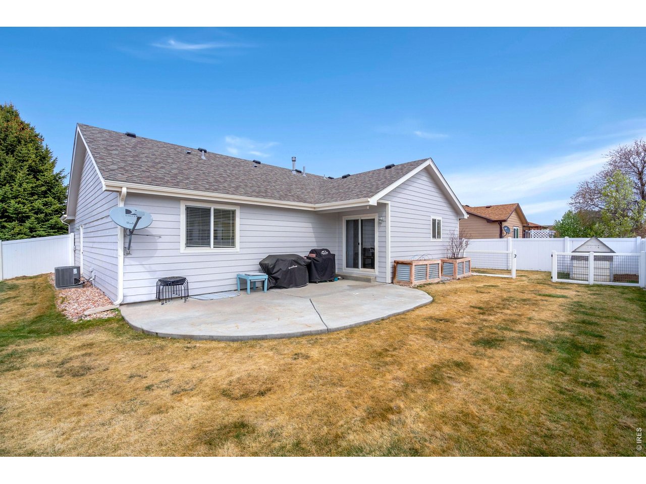 3779 Mount Meeker Street Wellington, CO 80549 - Photo 24 of 30 a view of a house with backyard and sitting area
