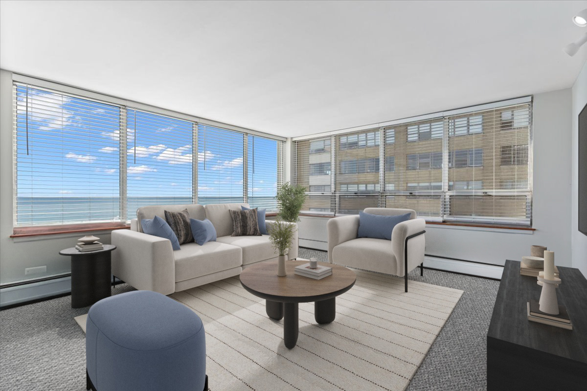 6171 North Sheridan Road, Unit 1112 Chicago, IL 60660 - Photo 5 of 23 a living room with furniture and a large window