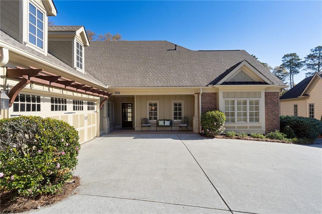 2472 Ballantrae Circle Cumming, GA 30041 - Photo 1 of 41 a front view of a house with a yard outdoor seating and barbeque oven
