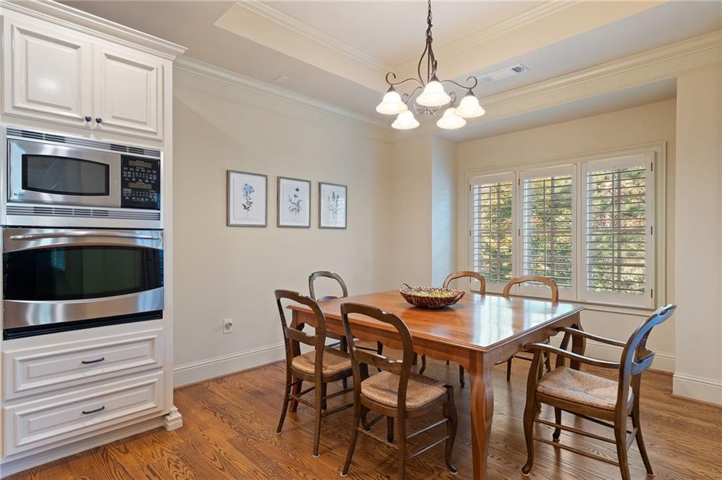 2472 Ballantrae Circle Cumming, GA 30041 - Photo 11 of 41 a dining room with furniture and window