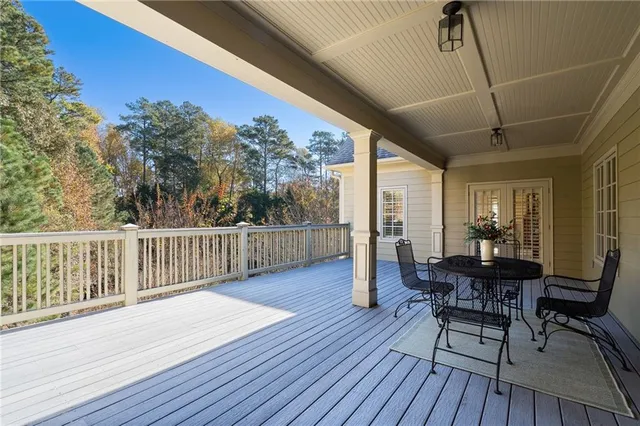 a view of a balcony with furniture