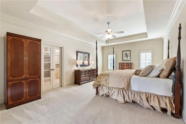 a living room with furniture and a walk in closet