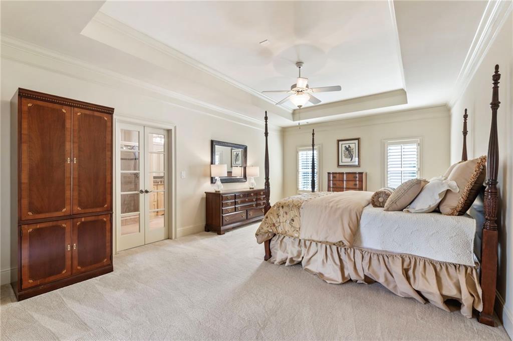 2472 Ballantrae Circle Cumming, GA 30041 - Photo 16 of 41 a living room with furniture and a walk in closet