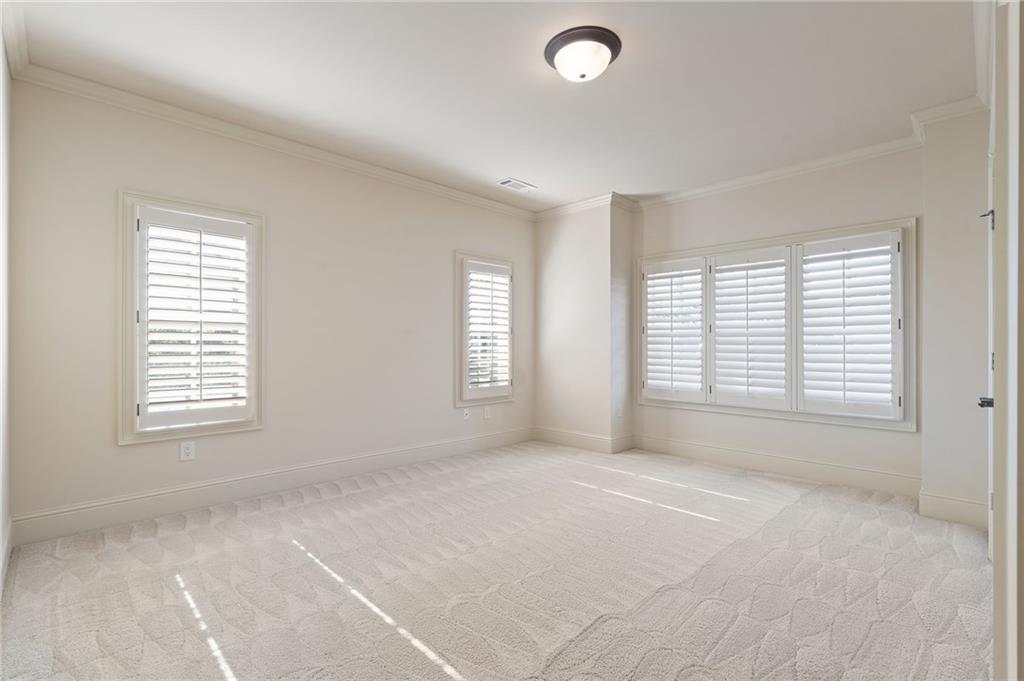2472 Ballantrae Circle Cumming, GA 30041 - Photo 22 of 41 a view of an empty room with a window