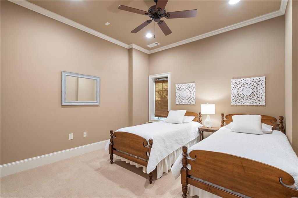 2472 Ballantrae Circle Cumming, GA 30041 - Photo 31 of 41 a bedroom with two beds and painting on the wall