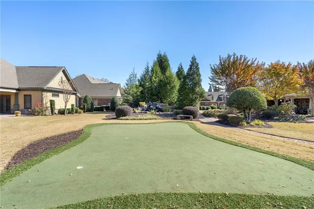 a view of outdoor space yard and swimming pool