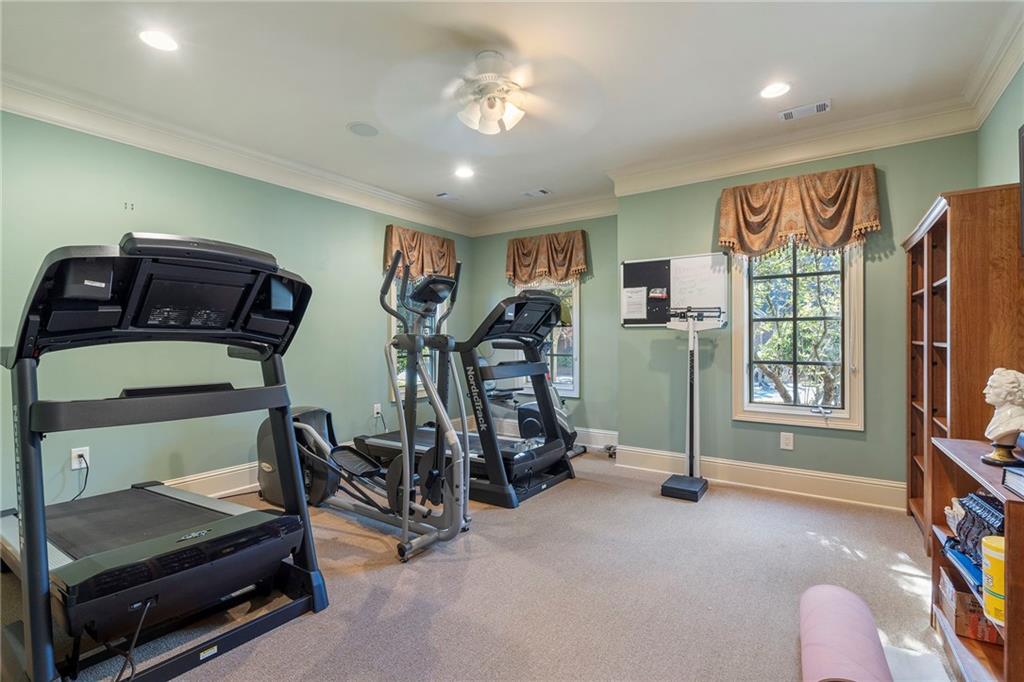 2472 Ballantrae Circle Cumming, GA 30041 - Photo 40 of 41 a view of a room with gym equipment