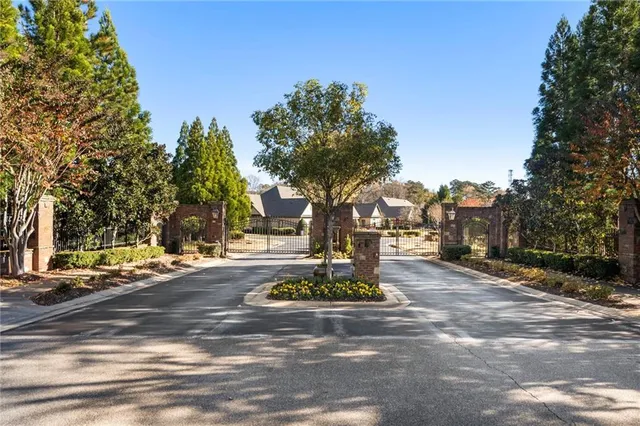 a sign board on the side of a street