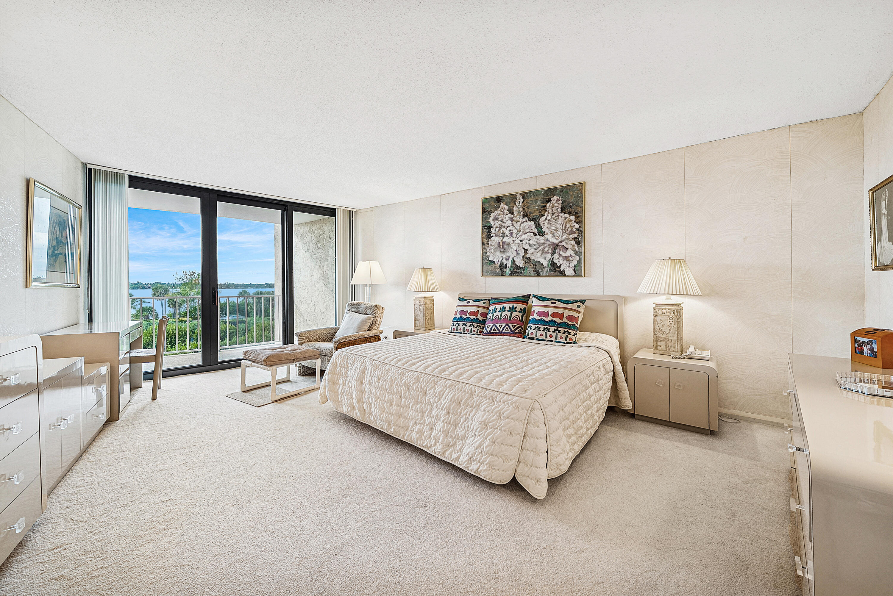 3400 South Ocean Boulevard, Unit 3HI Palm Beach, FL 33480 - Photo 14 of 50 a spacious bedroom with a bed and a large window