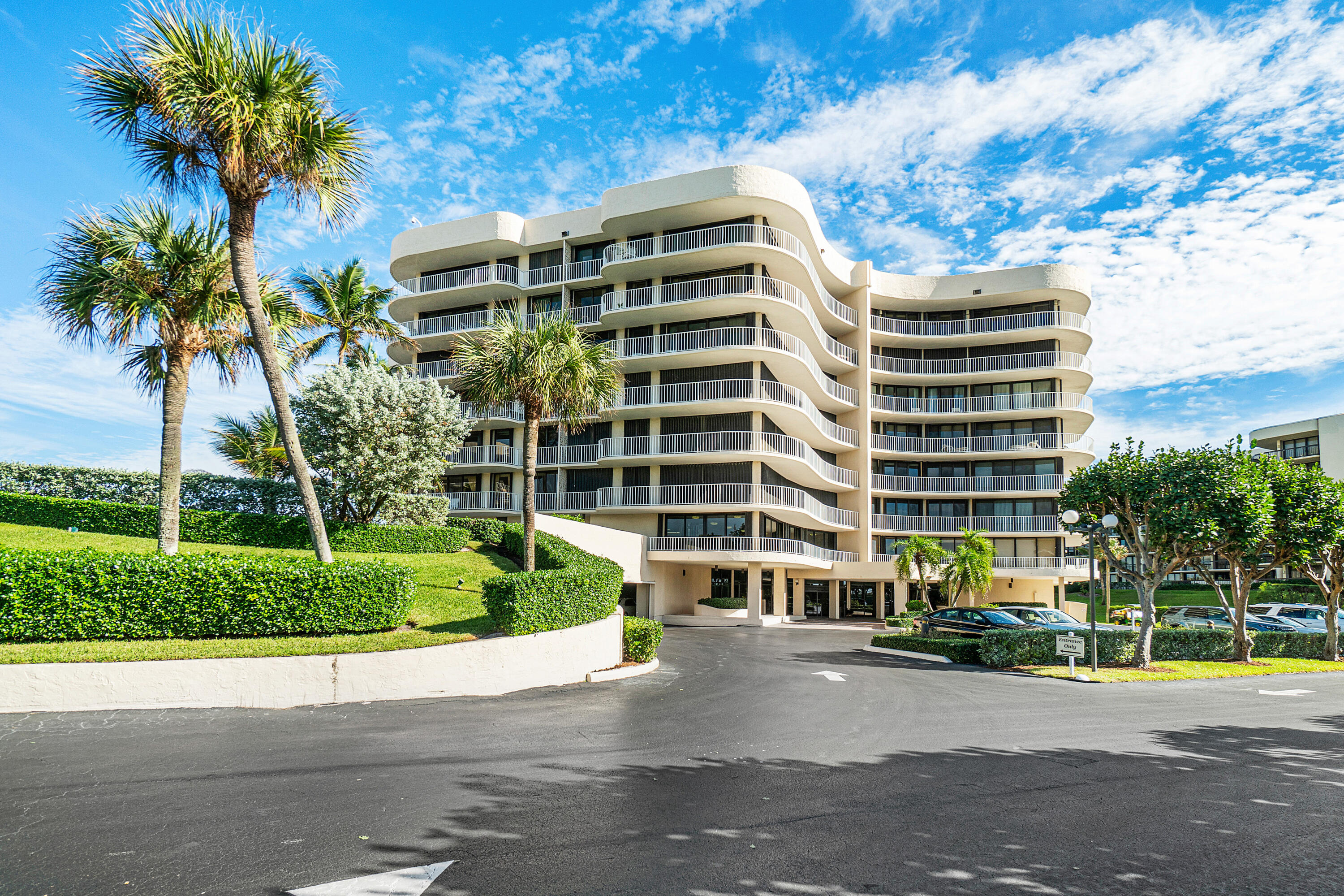 3400 South Ocean Boulevard, Unit 3HI Palm Beach, FL 33480 - Photo 42 of 50 a front view of a building with a garden and plants
