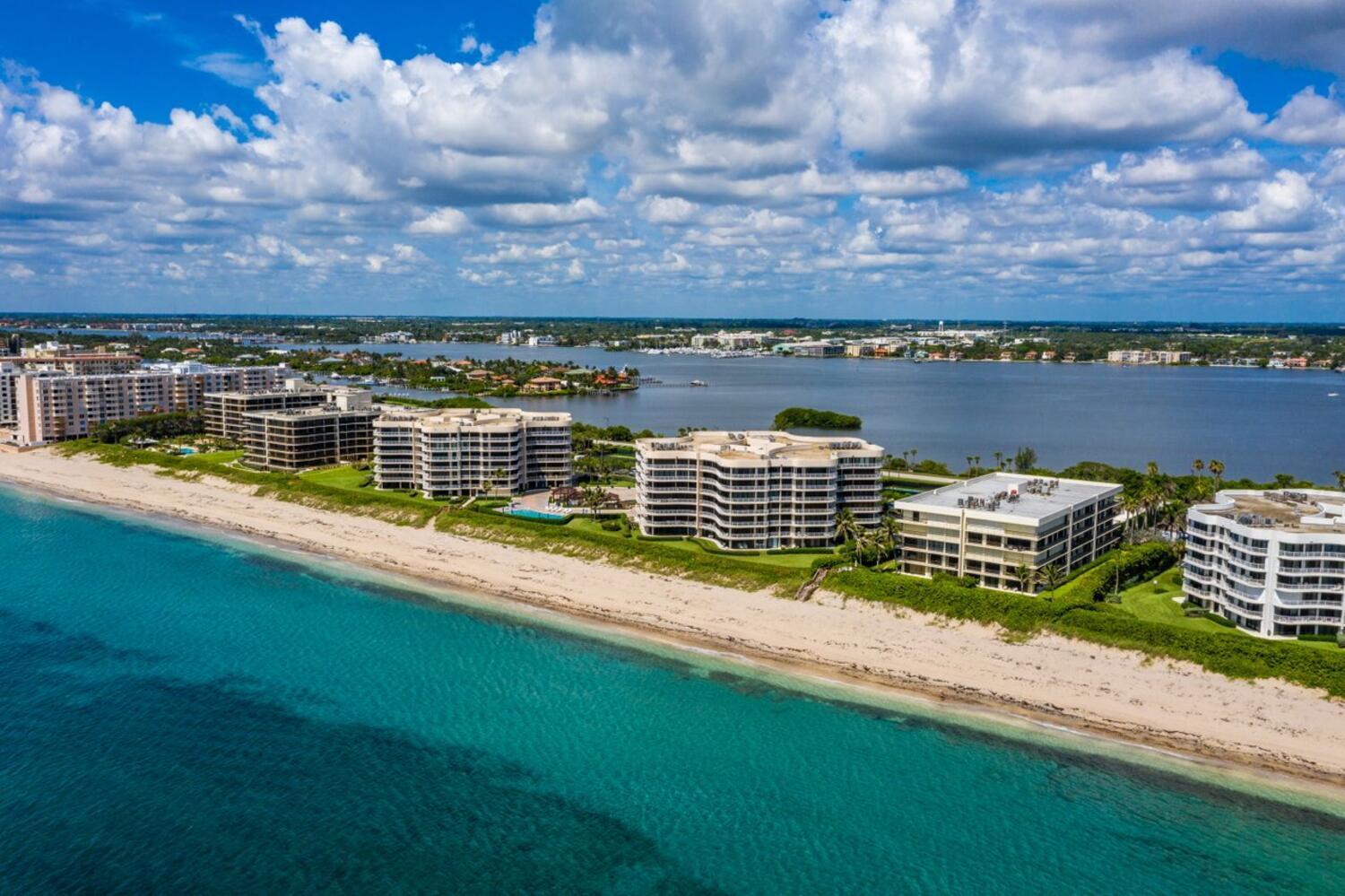 3400 South Ocean Boulevard, Unit 3HI Palm Beach, FL 33480 - Photo 48 of 50 a view of a city with lawn chairs