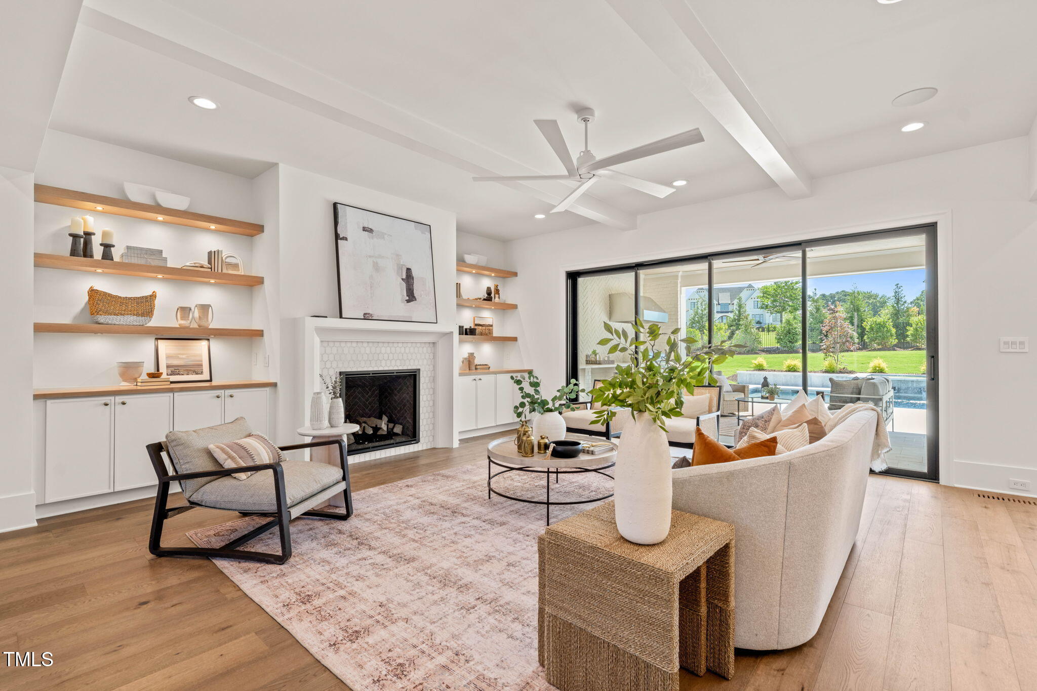 1608 Legacy Ridge Lane Wake Forest, NC 27587 - Photo 11 of 74 a living room with furniture and a fireplace