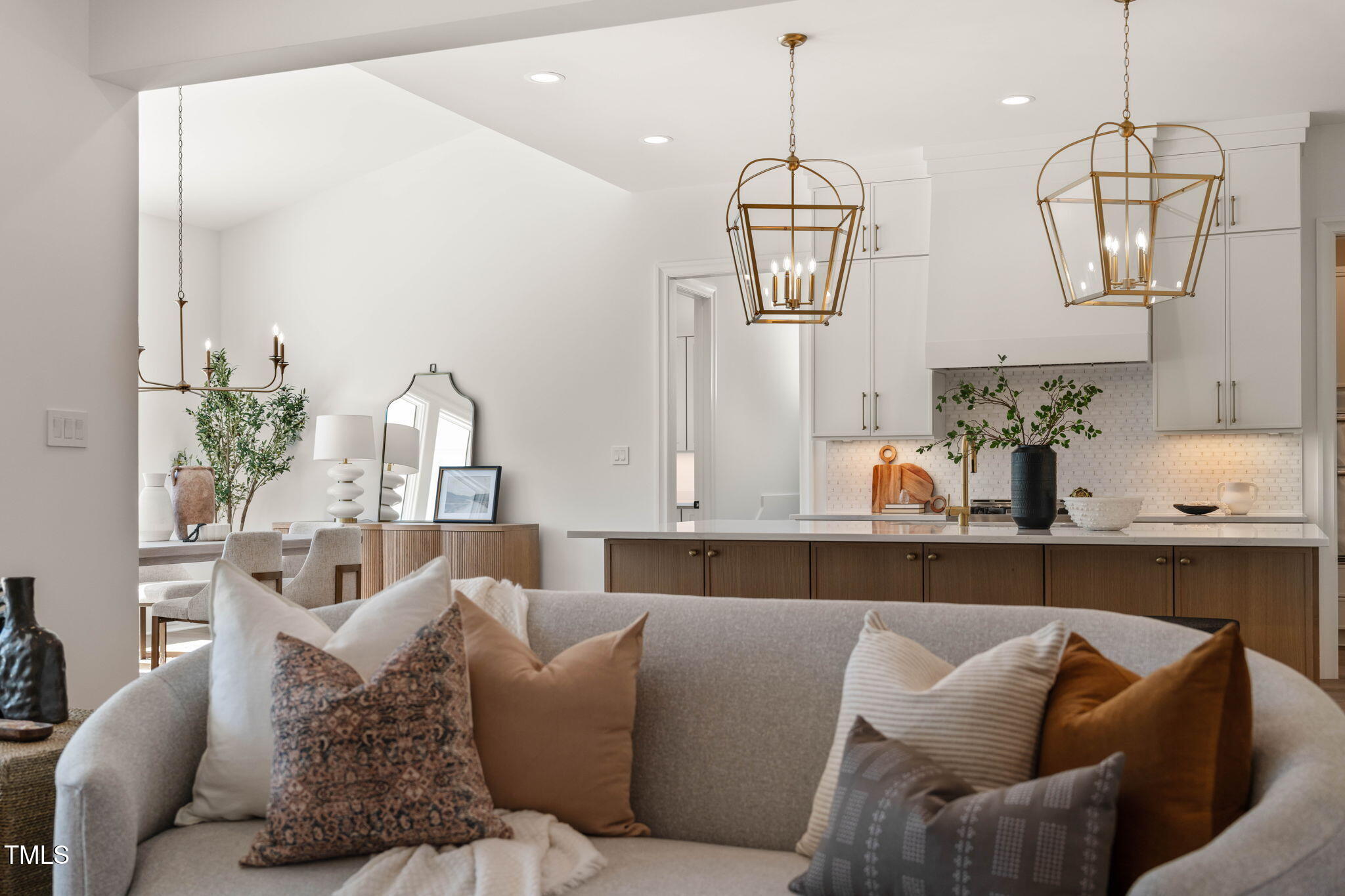 1608 Legacy Ridge Lane Wake Forest, NC 27587 - Photo 13 of 74 a living room with furniture kitchen view and large windows